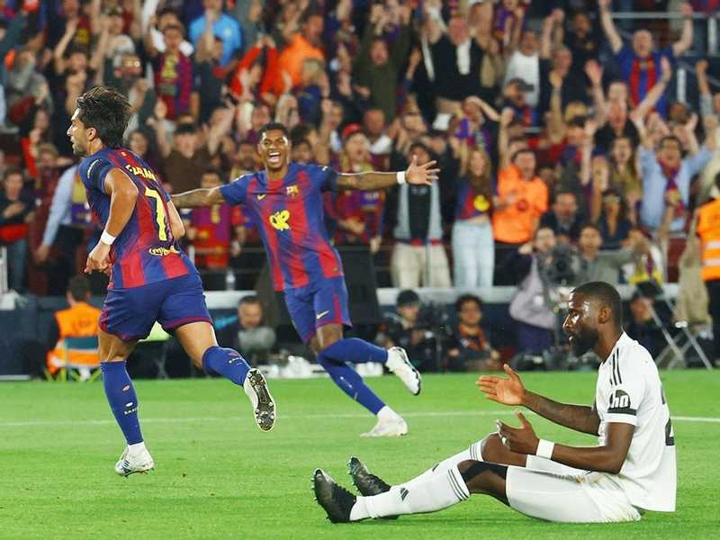 برشلونه يضرب الريال بثنائيه.. ويتوج بالدوري الاسباني رسميا
