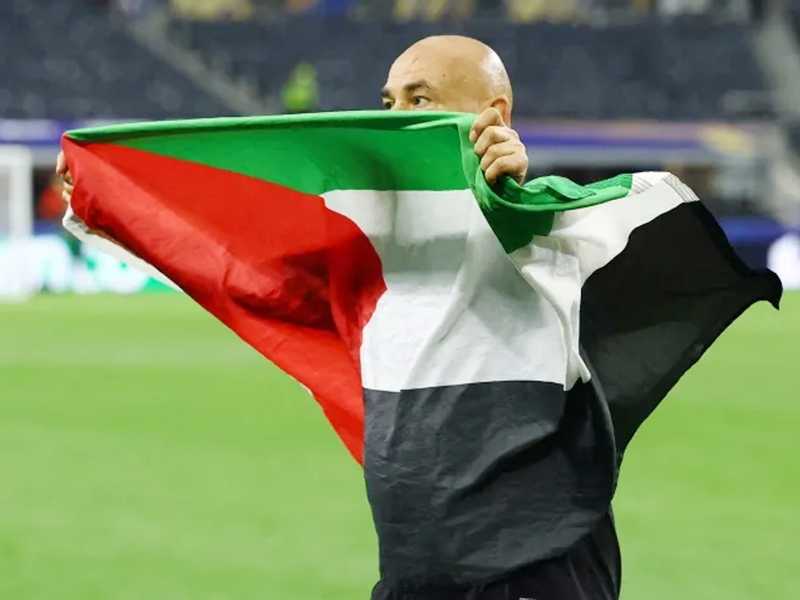 الفيفا يعلن عدم معاقبه حسام حسن بسبب رفعه علم فلسطين